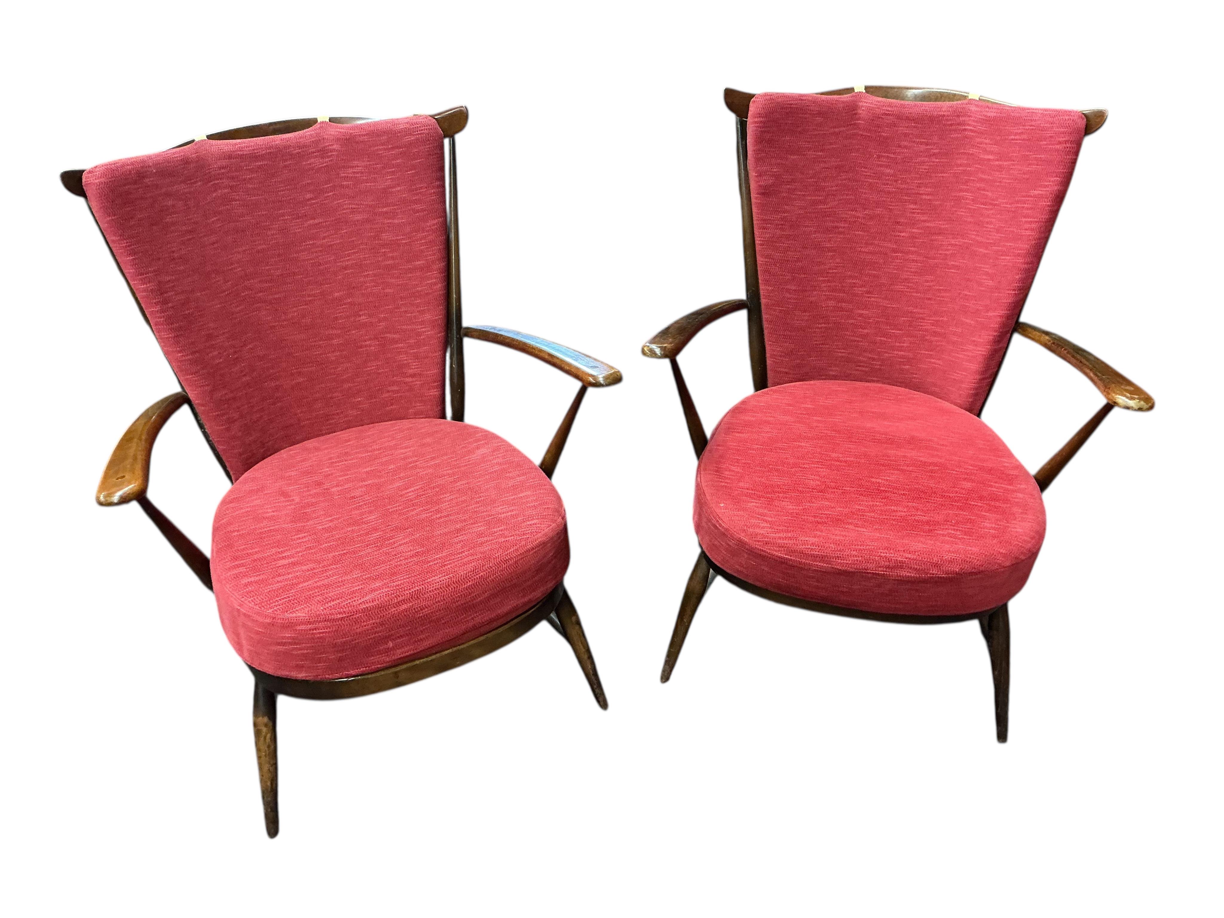 A pair of Ercol armchairs, width 70cm, depth 60cm, height 86cm